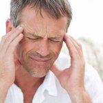A man has a headache