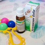 packaging and bottle of drops Espumisan baby